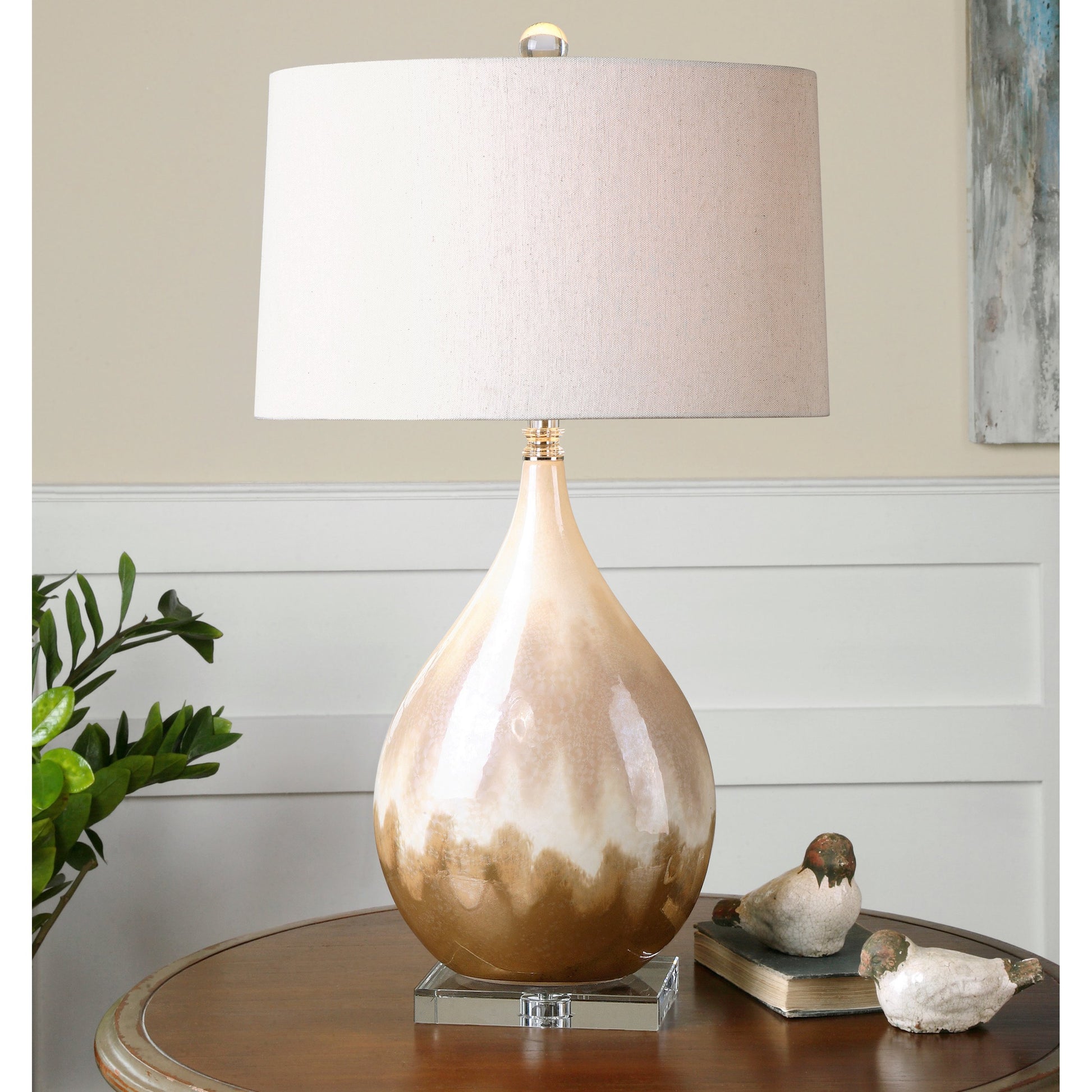 Flavian Glazed Ceramic Lamp by Uttermost. Made from crystal, ceramic in a modern style.