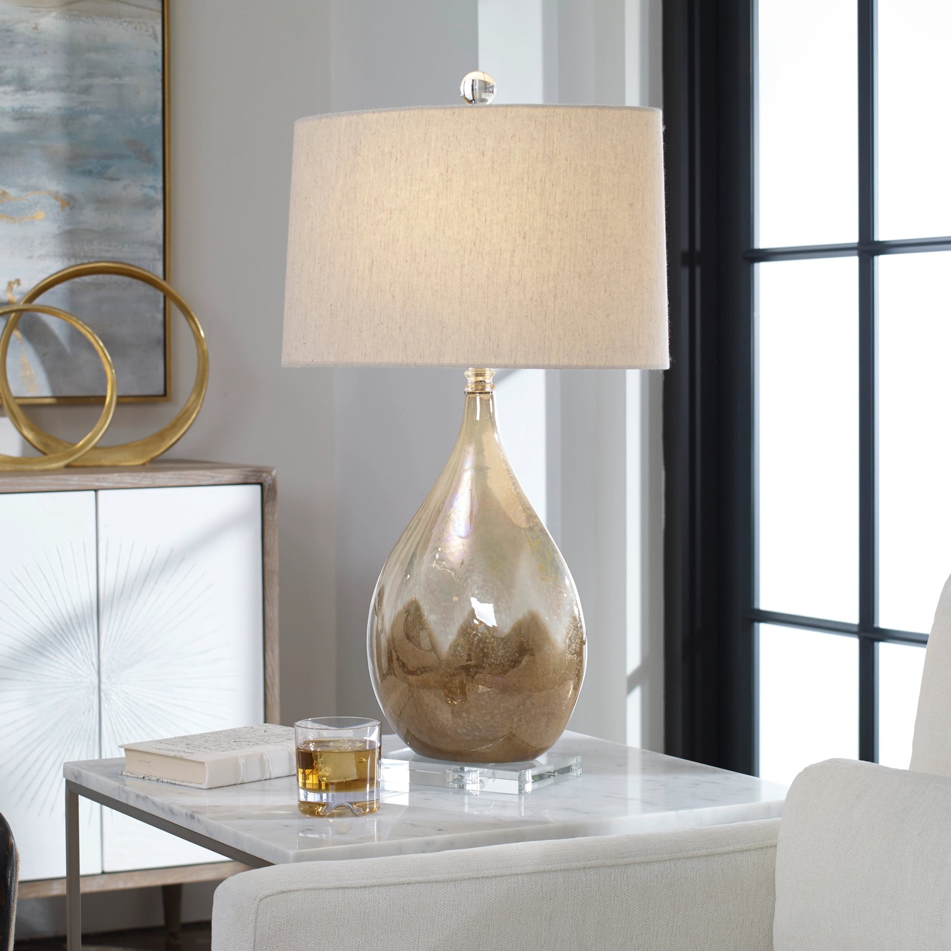 Flavian Glazed Ceramic Lamp by Uttermost. Made from crystal, ceramic in a modern style.
