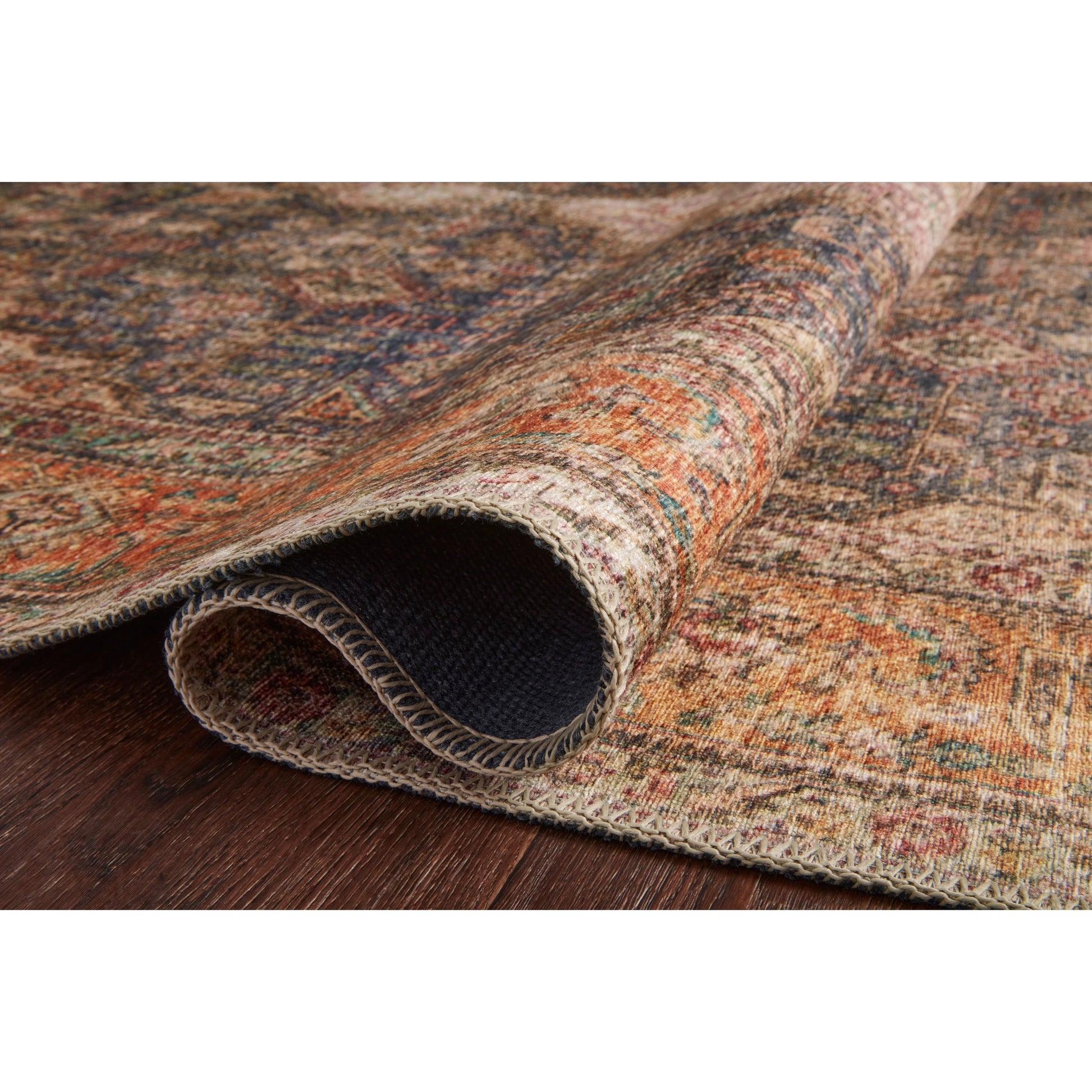 Loren LQ-02 Rug by Loloi in plum, multi. Made from 100% polyester in a rustic style.