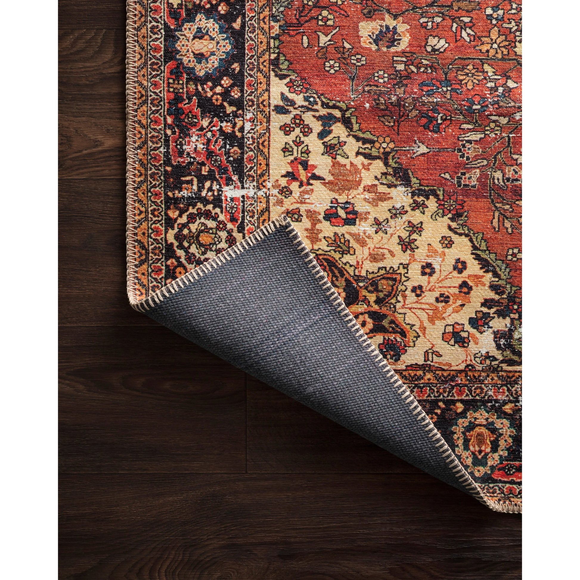 Loren LQ-07 Rug by Loloi in red, navy. Made from 100% polyester in a rustic style.