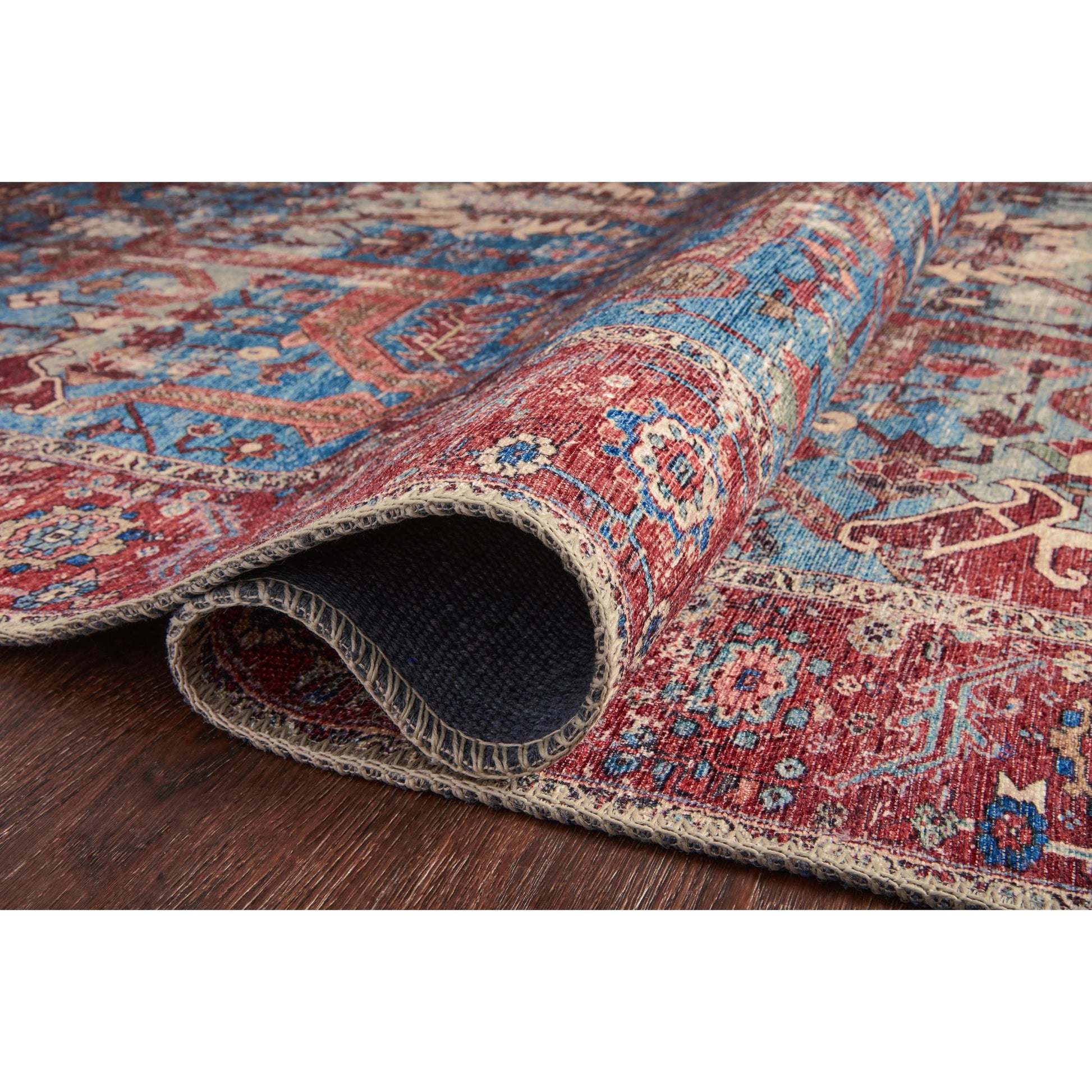 Loren LQ-10 Rug by Loloi in blue, red. Made from 100% polyester in a rustic style.