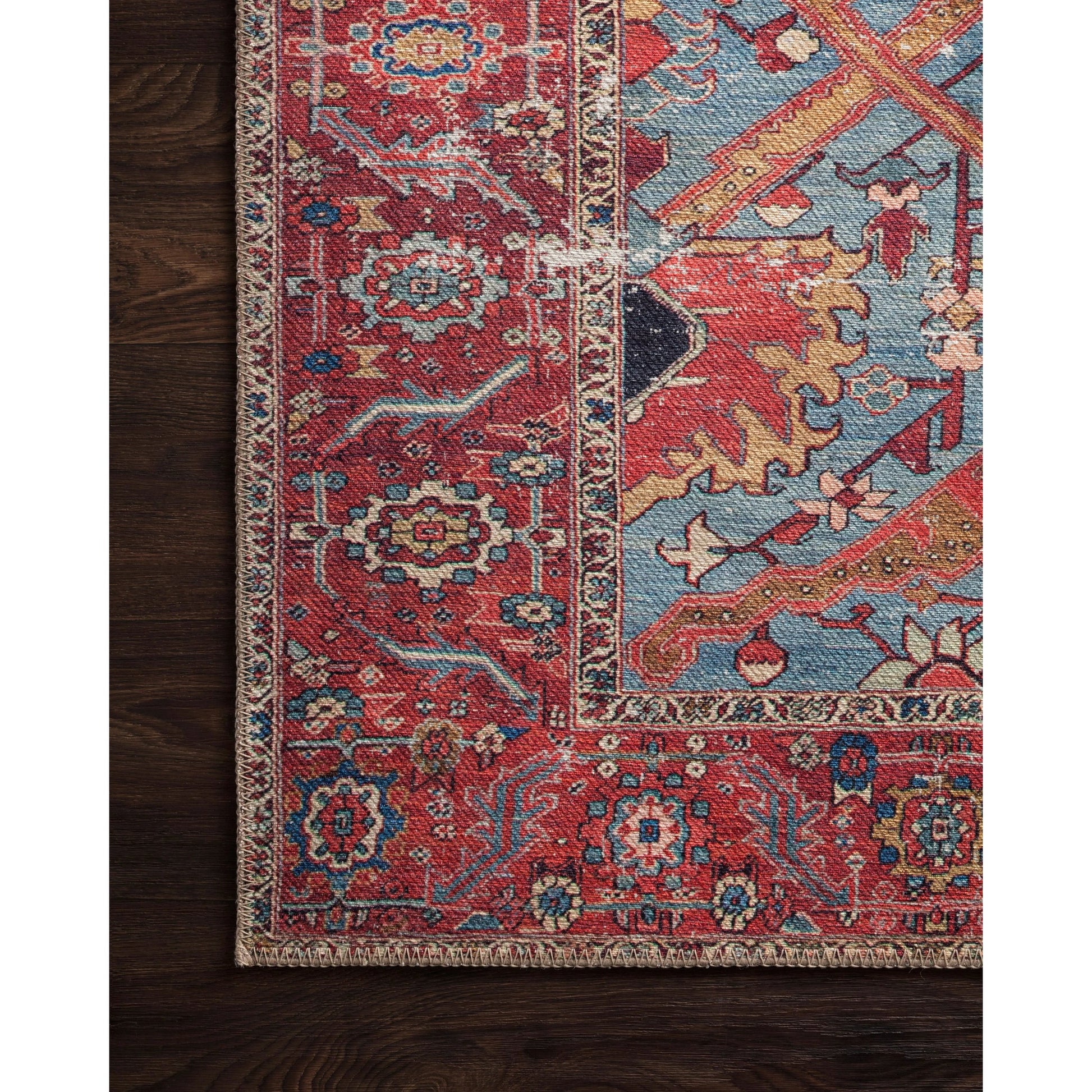 Loren LQ-10 Rug by Loloi in blue, red. Made from 100% polyester in a rustic style.