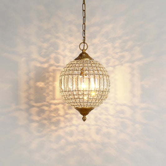 Crystal Orb Pendant by The Livingston Collection in antique gold. Made from iron & crystals in a traditional style.