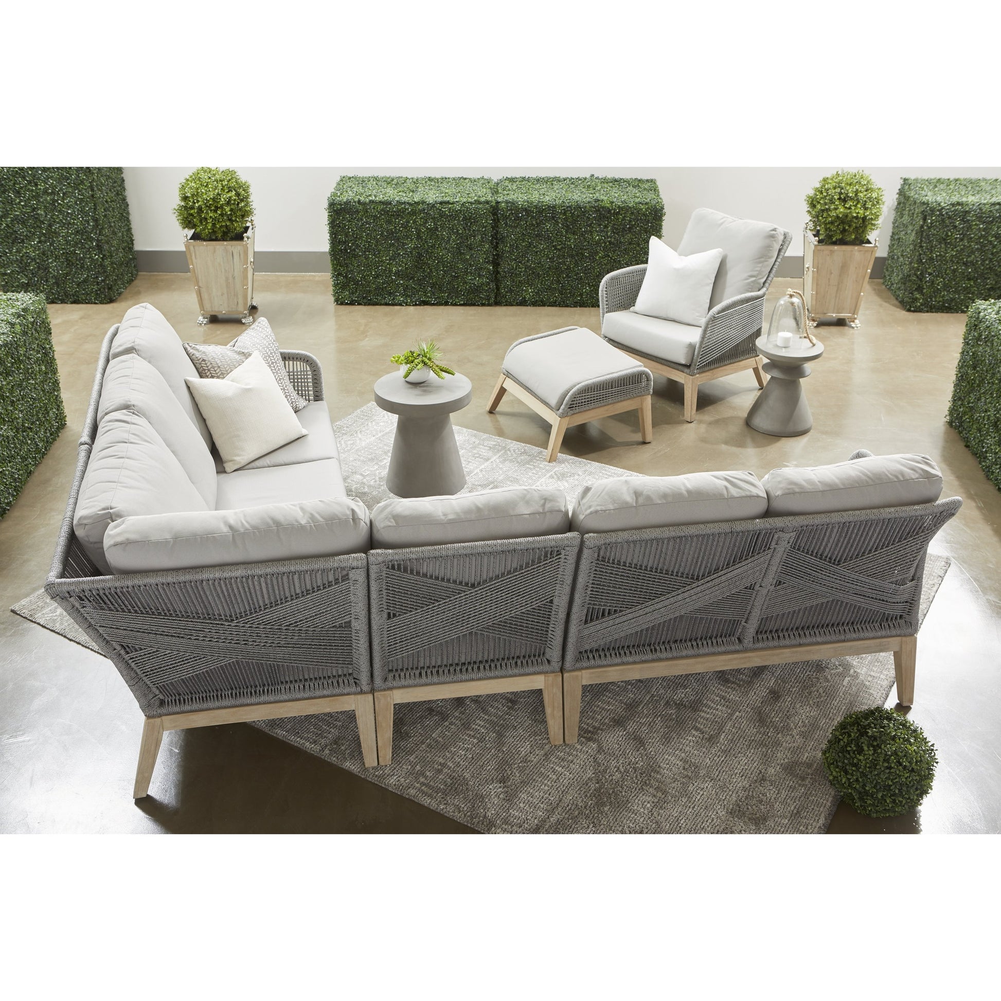 Loom Club Chair by Essentials For Living in gray teak, taupe, white flat rope, performance pumice. Made from solid teak wood, aluminum, 100% polyolefin rope, 100% olefin fabric, foam in a coastal style.
