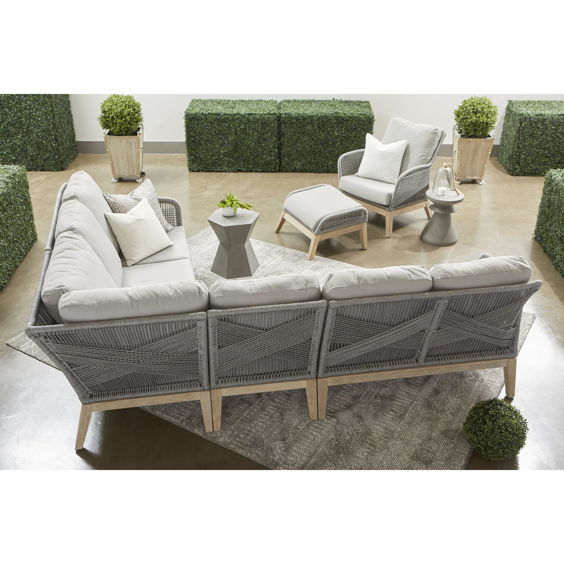 Loom Club Chair by Essentials For Living in gray teak, taupe, white flat rope, performance pumice. Made from solid teak wood, aluminum, 100% polyolefin rope, 100% olefin fabric, foam in a coastal style.
