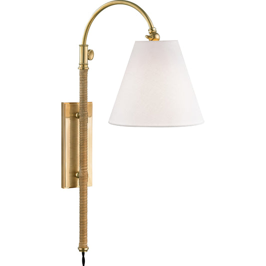 Curves NO.1 Adjustable Wall Sconce W/Rattan Accent by Hudson Valley in aged brass. Made from brass in a traditional style.