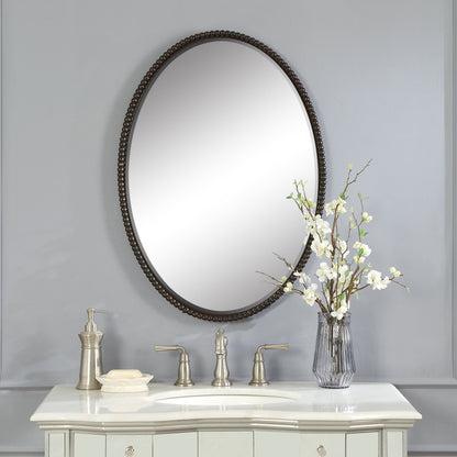 Sherise Oval Mirror by Uttermost. Made from metal, glass in a modern style.