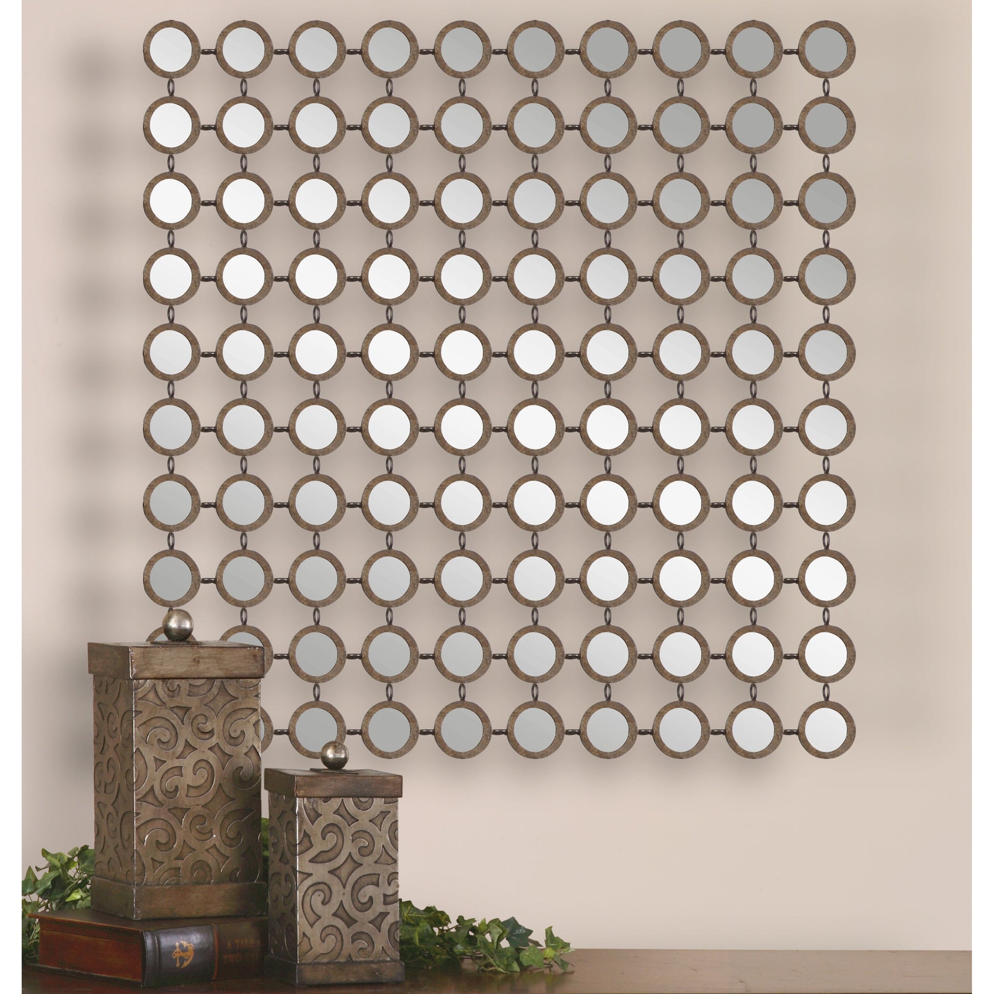 Dinuba Champagne Mirror by Uttermost in silver. Made from metal in a modern style.