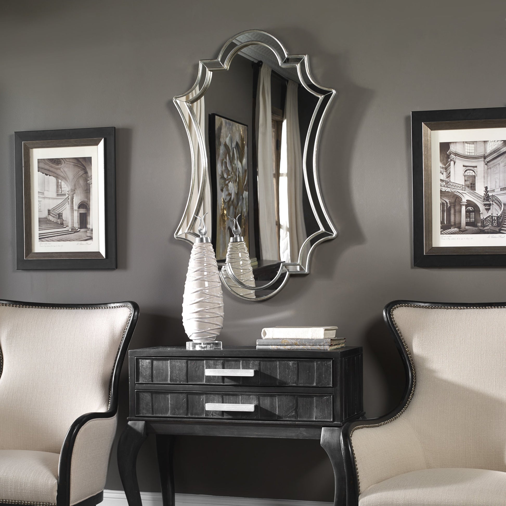 Elara Wall Mirror by Uttermost in silver. Made from pu leather, mdf, glass in a transitional style.