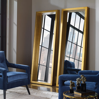 Edmonton Gold Leaner Mirror by Uttermost in gold. Made from pine in a modern style.