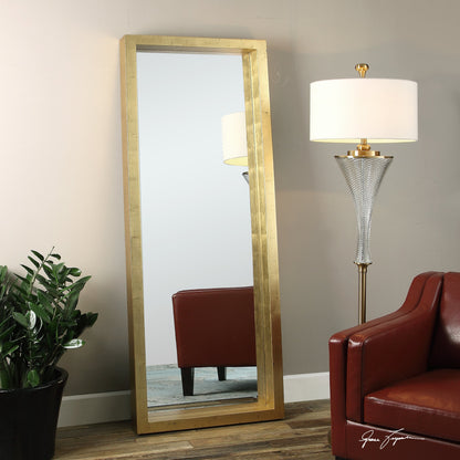 Edmonton Gold Leaner Mirror by Uttermost in gold. Made from pine in a modern style.
