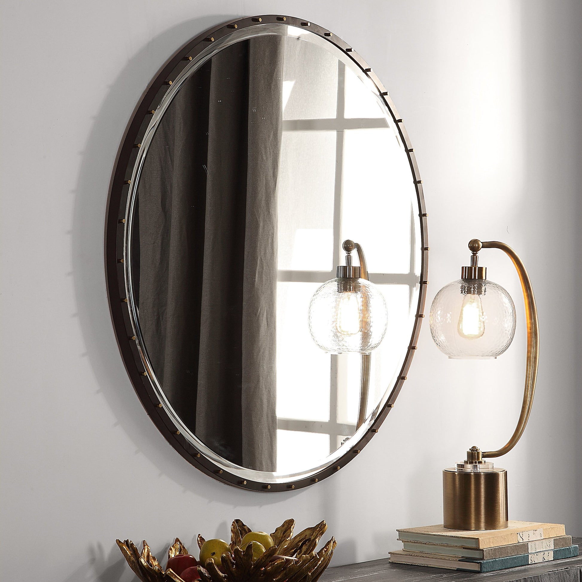 Benedo Round Mirror by Uttermost. Made from metal, mirror in a modern style.