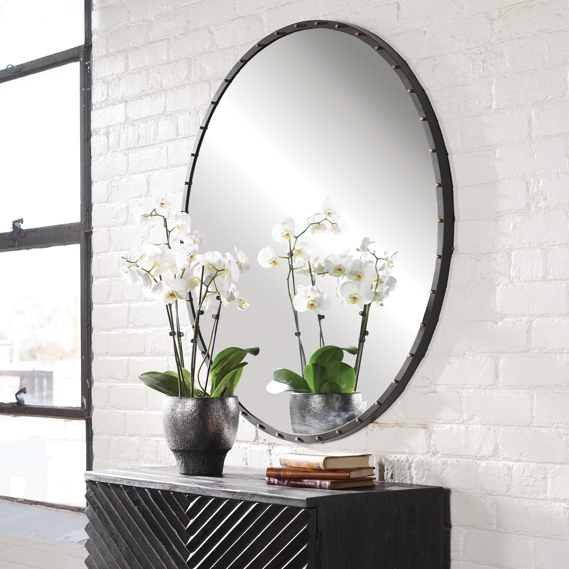 Benedo Round Mirror by Uttermost. Made from metal, mirror in a modern style.