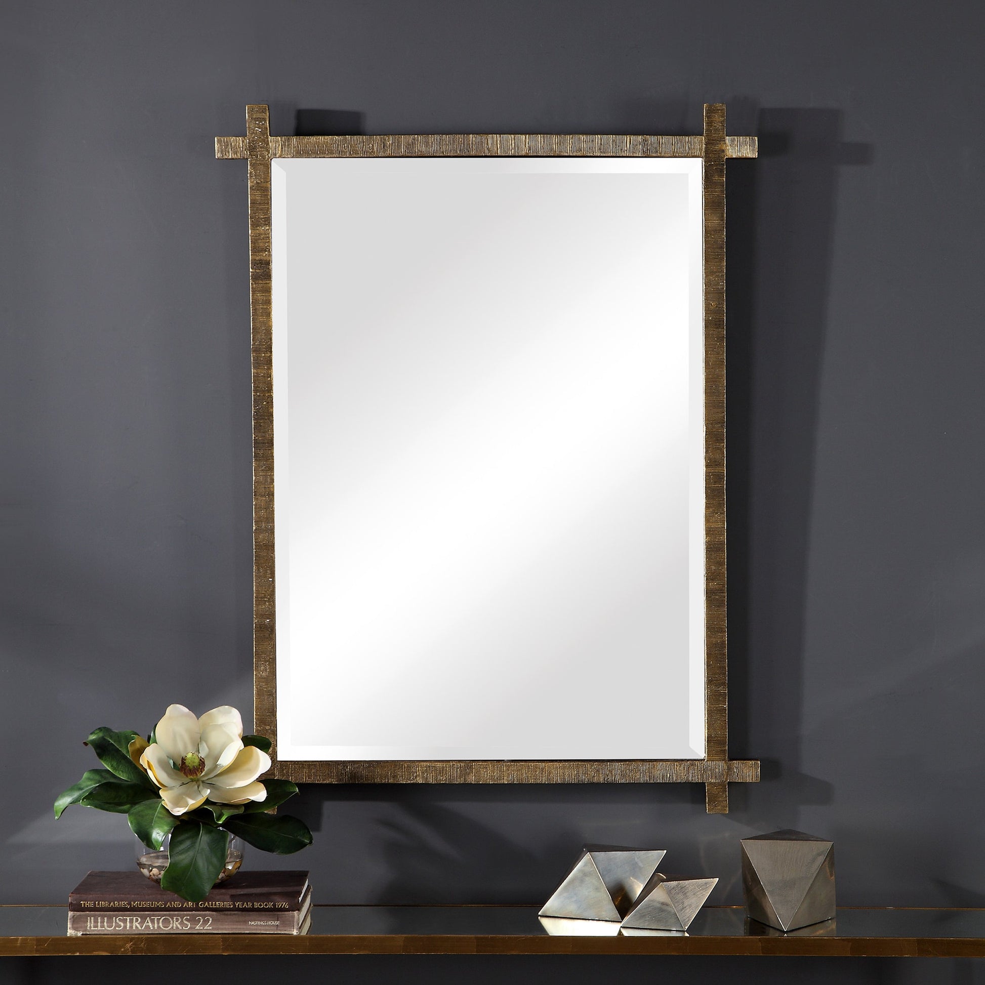 Abanu Vanity Mirror by Uttermost in gold. Made from resin, mdf, mirror in a modern style.