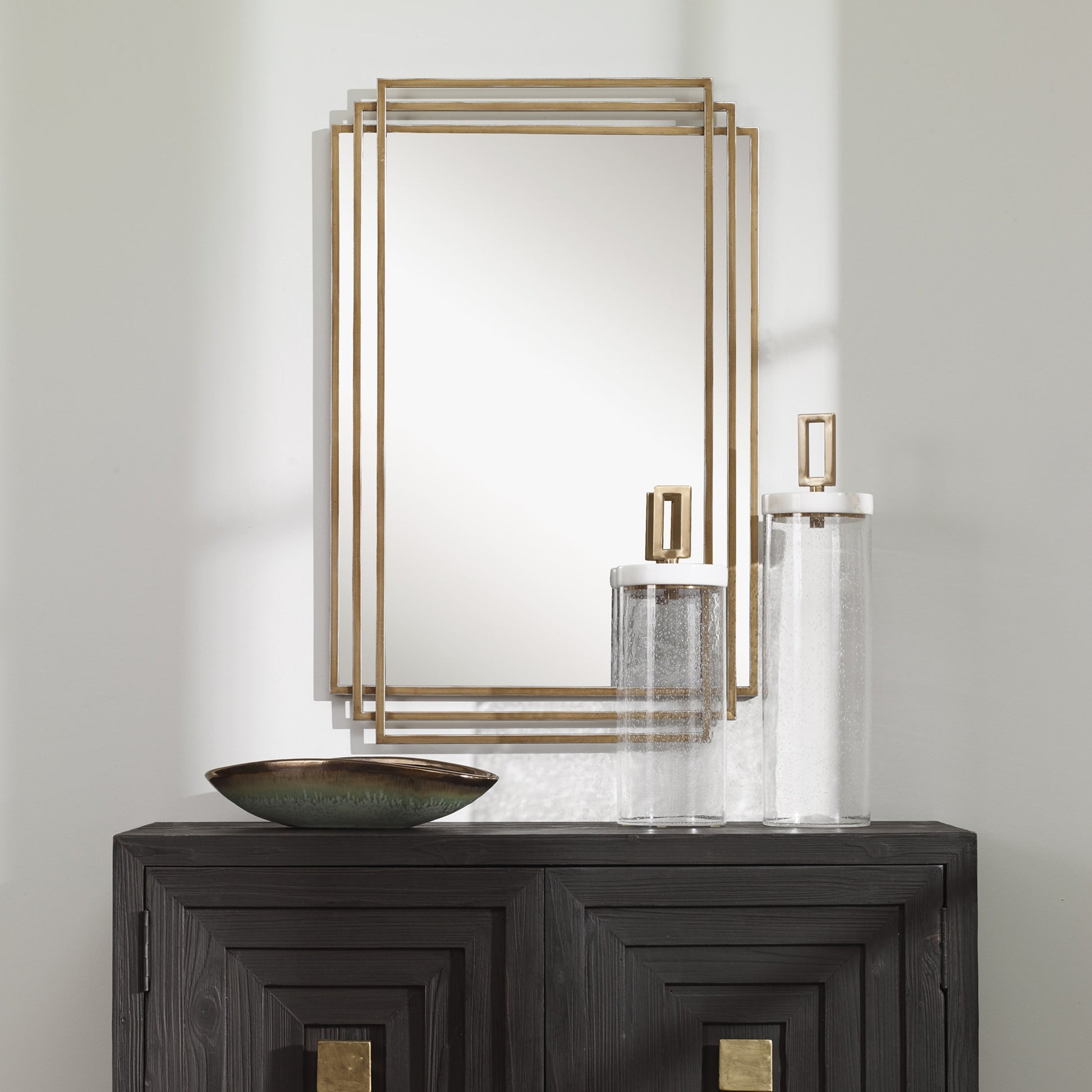 Amherst Brushed Mirror by Uttermost in gold. Made from iron, mdf, mirror in a transitional style.