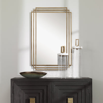 Amherst Brushed Mirror by Uttermost in gold. Made from iron, mdf, mirror in a transitional style.