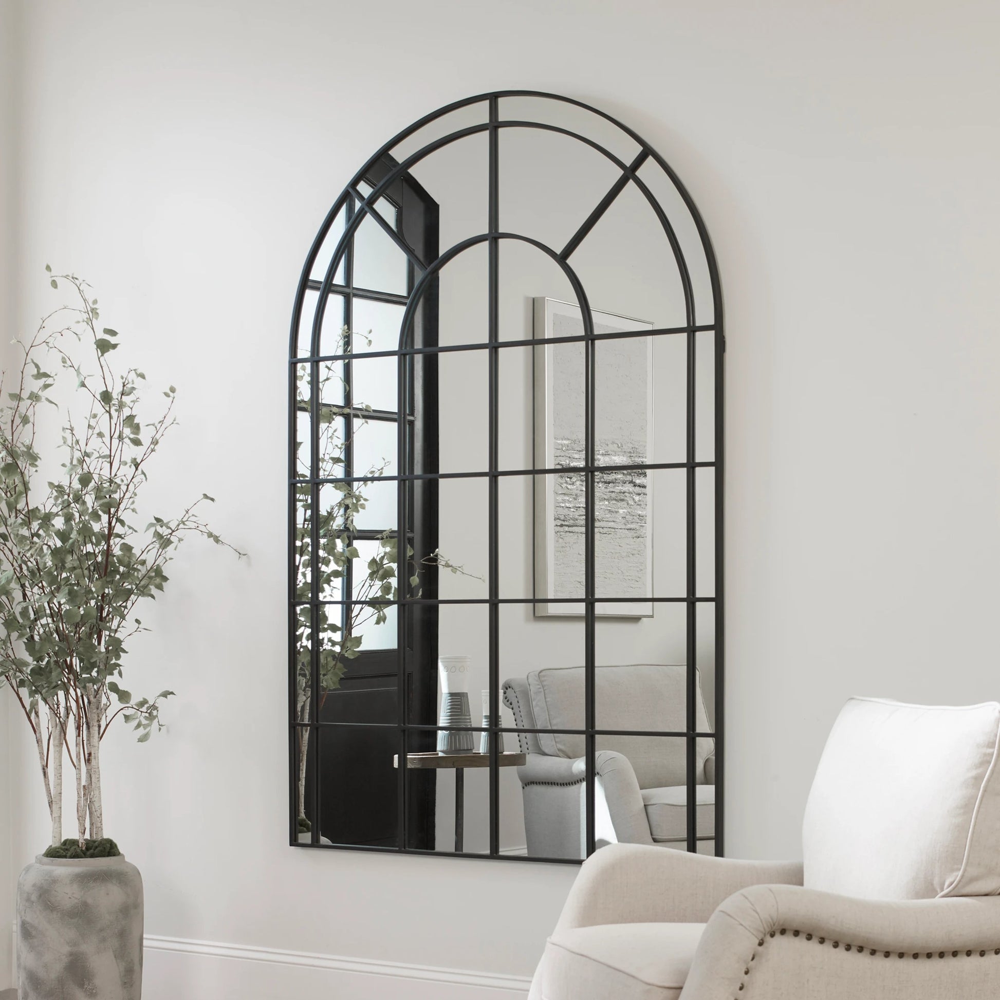 Grantola Arch Mirror by Uttermost in iron. Made from iron, mdf, glass in a cottage & farmhouse style.