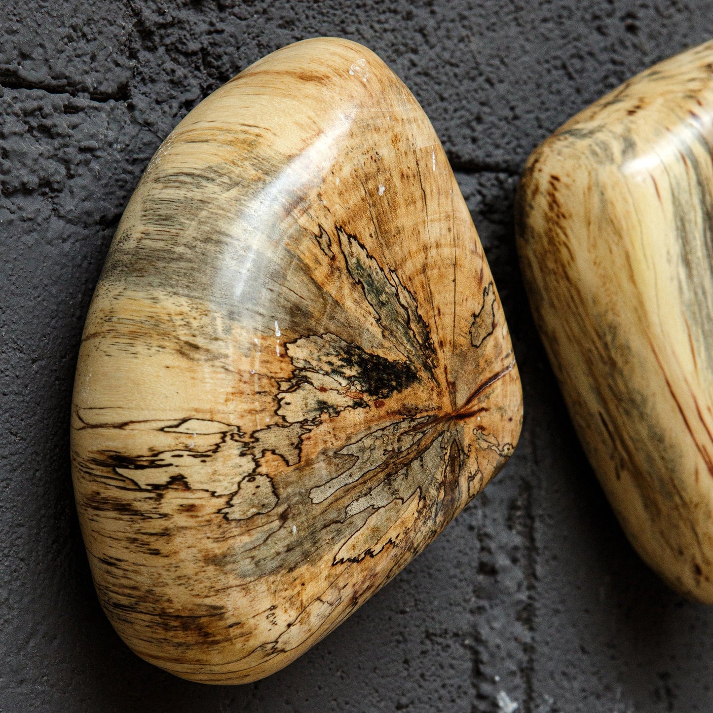 009 SI-1923549 | Closeup | Pebbles Wall Decor by Uttermost. Made from tamarind wood in a modern style.