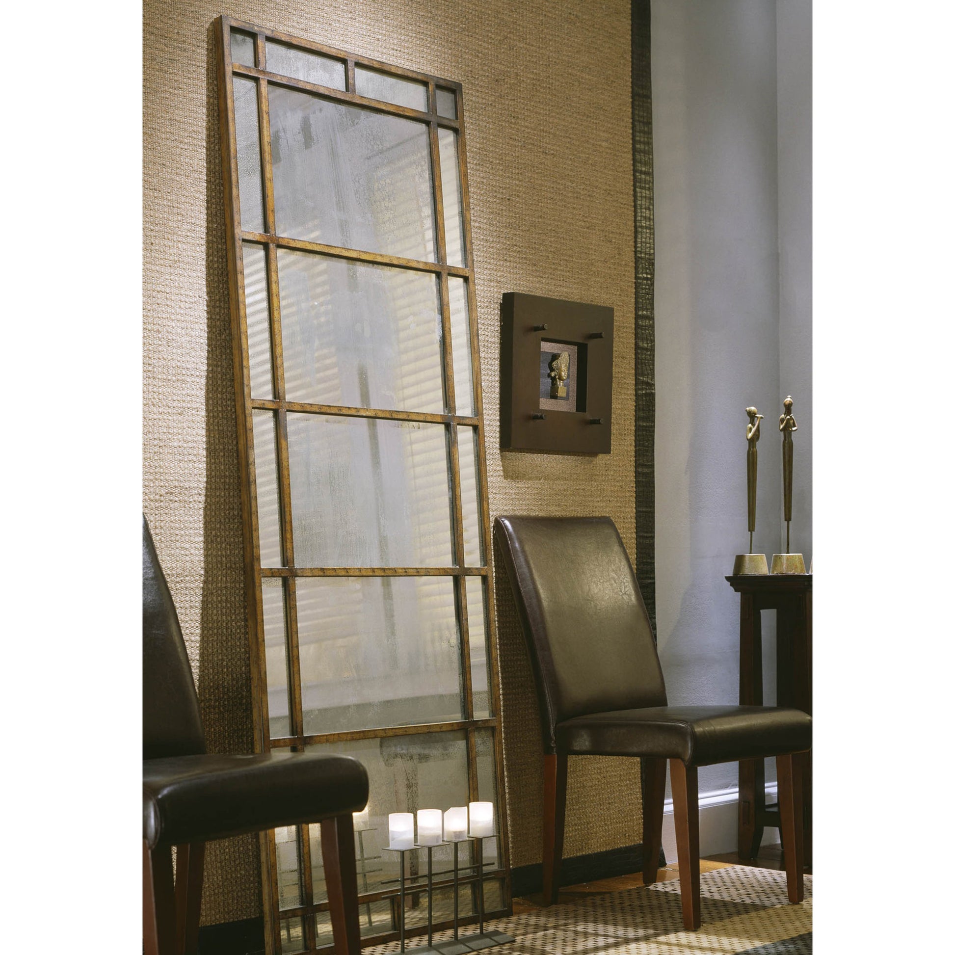 Avidan Mirror by Uttermost in gold. Made from metal in a modern style.