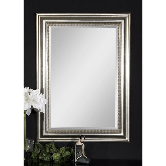 Stuart Mirror by Uttermost in silver. Made from wood in a rustic style.