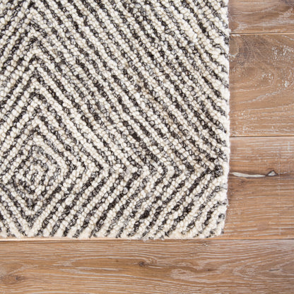 Traditions Made Modern Tufted MMT19 Rug by Jaipur Living in white, gray. Made from 100% wool in a unique style.