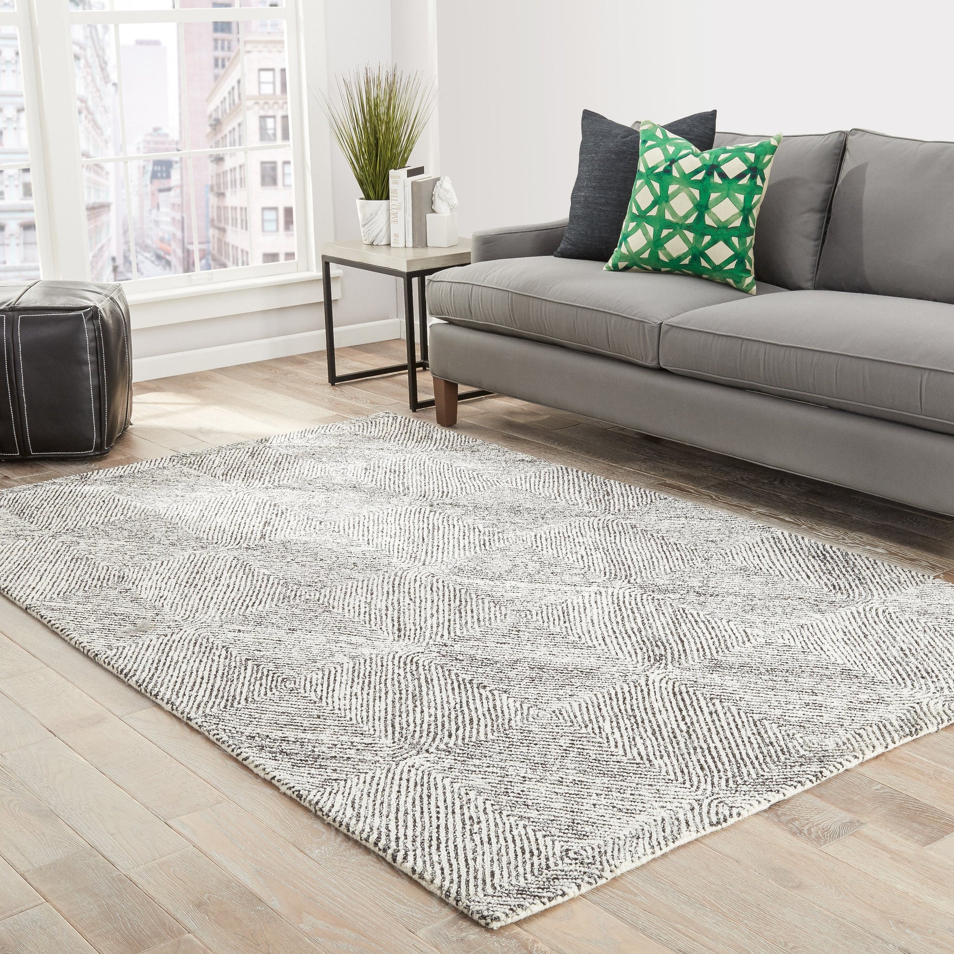 Traditions Made Modern Tufted MMT19 Rug by Jaipur Living in white, gray. Made from 100% wool in a unique style.