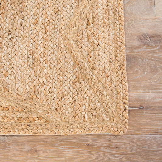 Naturals Tobago NAT23 Rug by Jaipur Living in beige. Made from 100% jute in a unique style.