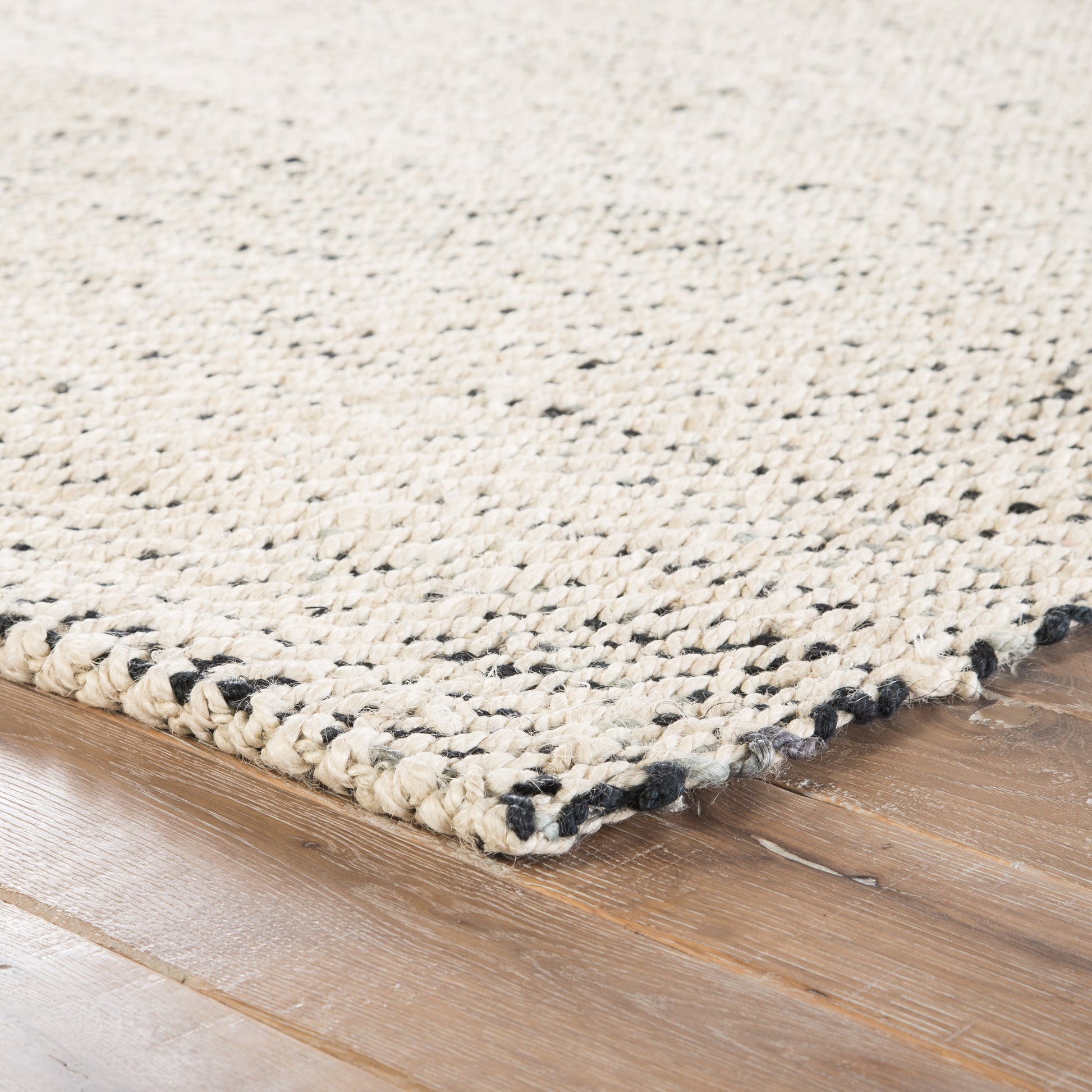 Naturals Tobago NAT26 Rug by Jaipur Living in white, black. Made from 100% jute in a unique style.