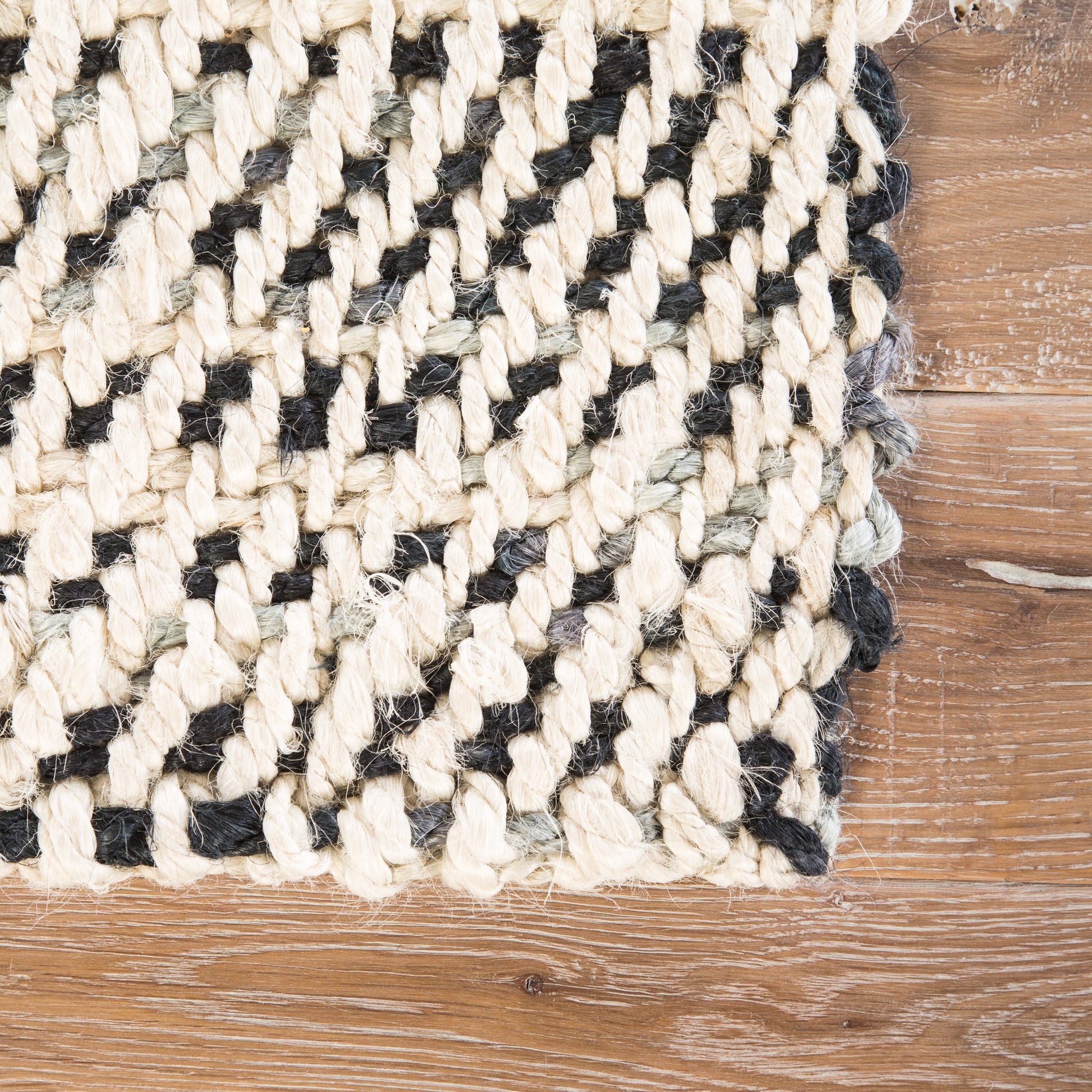 Naturals Tobago NAT26 Rug by Jaipur Living in white, black. Made from 100% jute in a unique style.