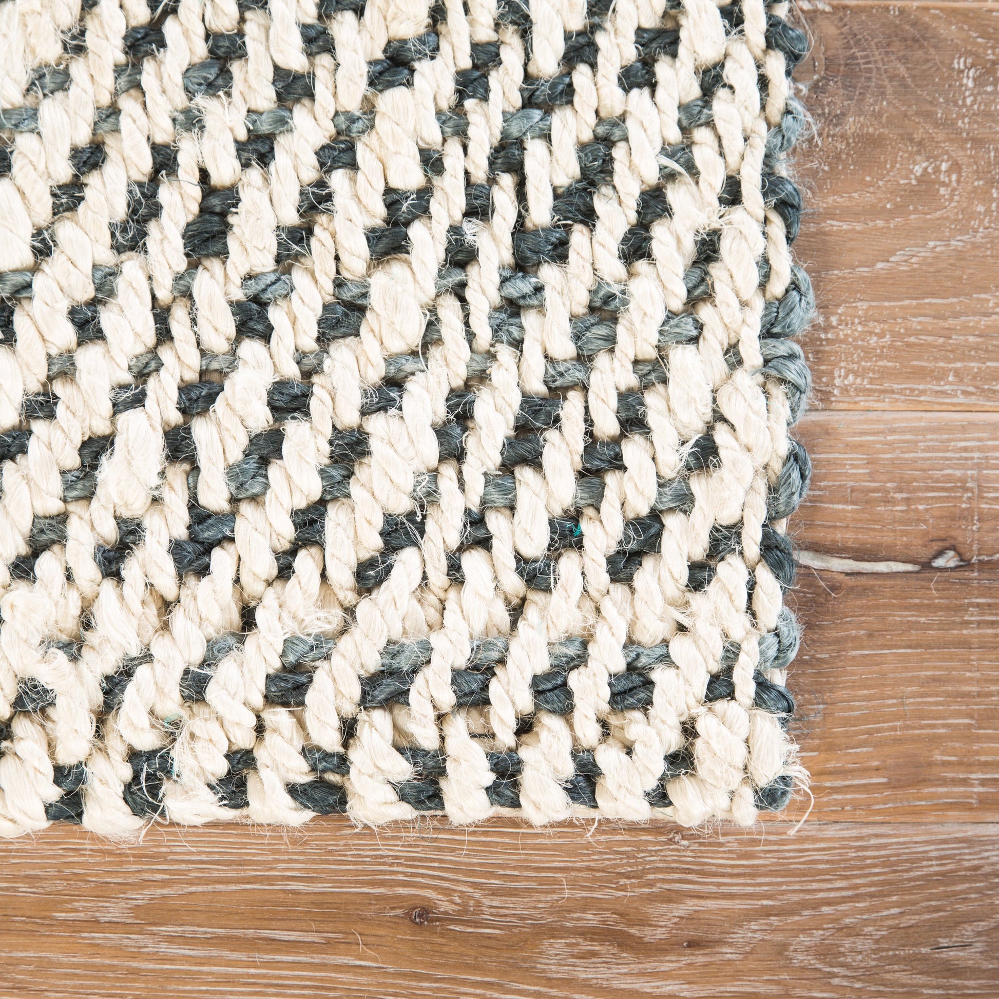Naturals Tobago NAT26 Rug by Jaipur Living in white, black. Made from 100% jute in a unique style.