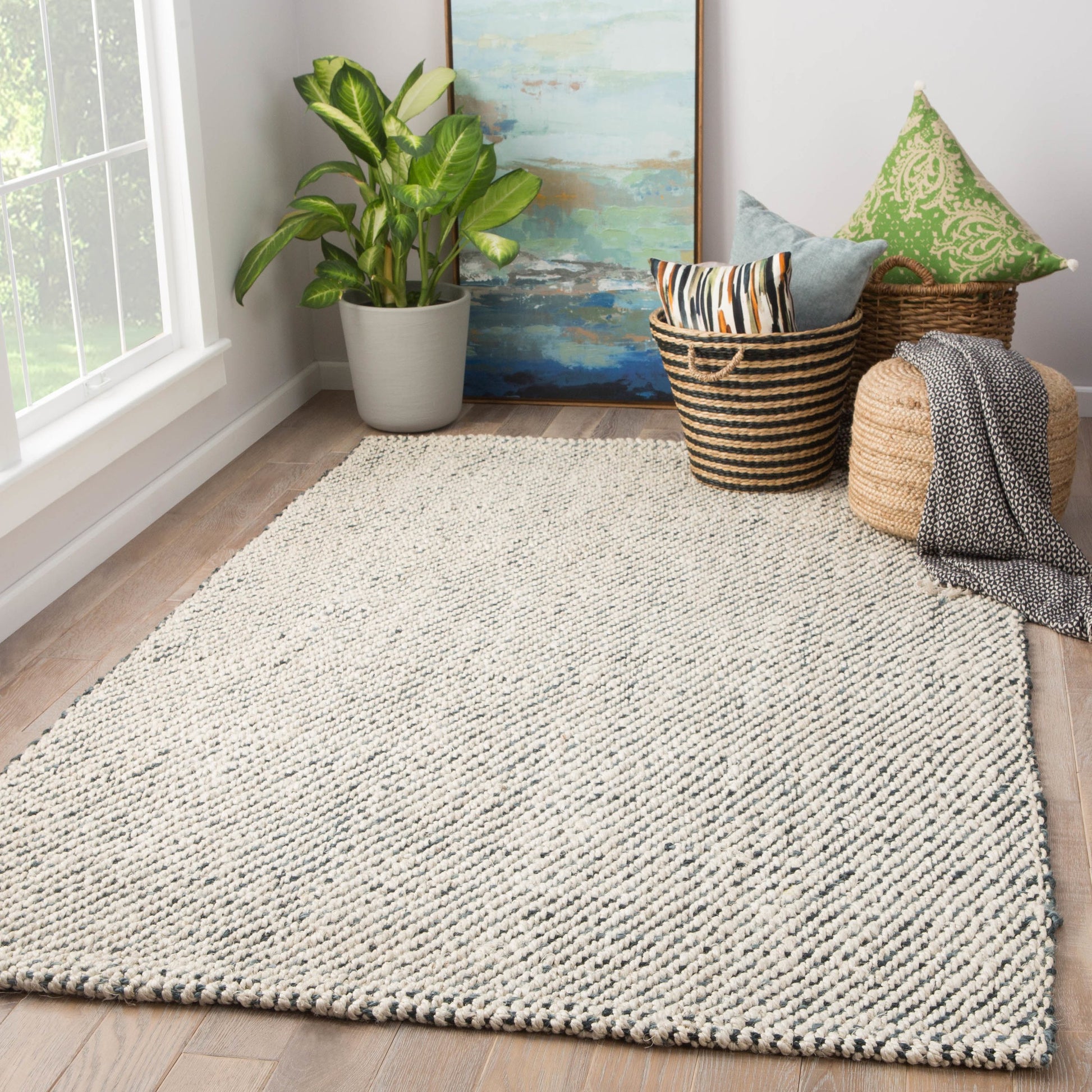 Naturals Tobago NAT26 Rug by Jaipur Living in white, black. Made from 100% jute in a unique style.