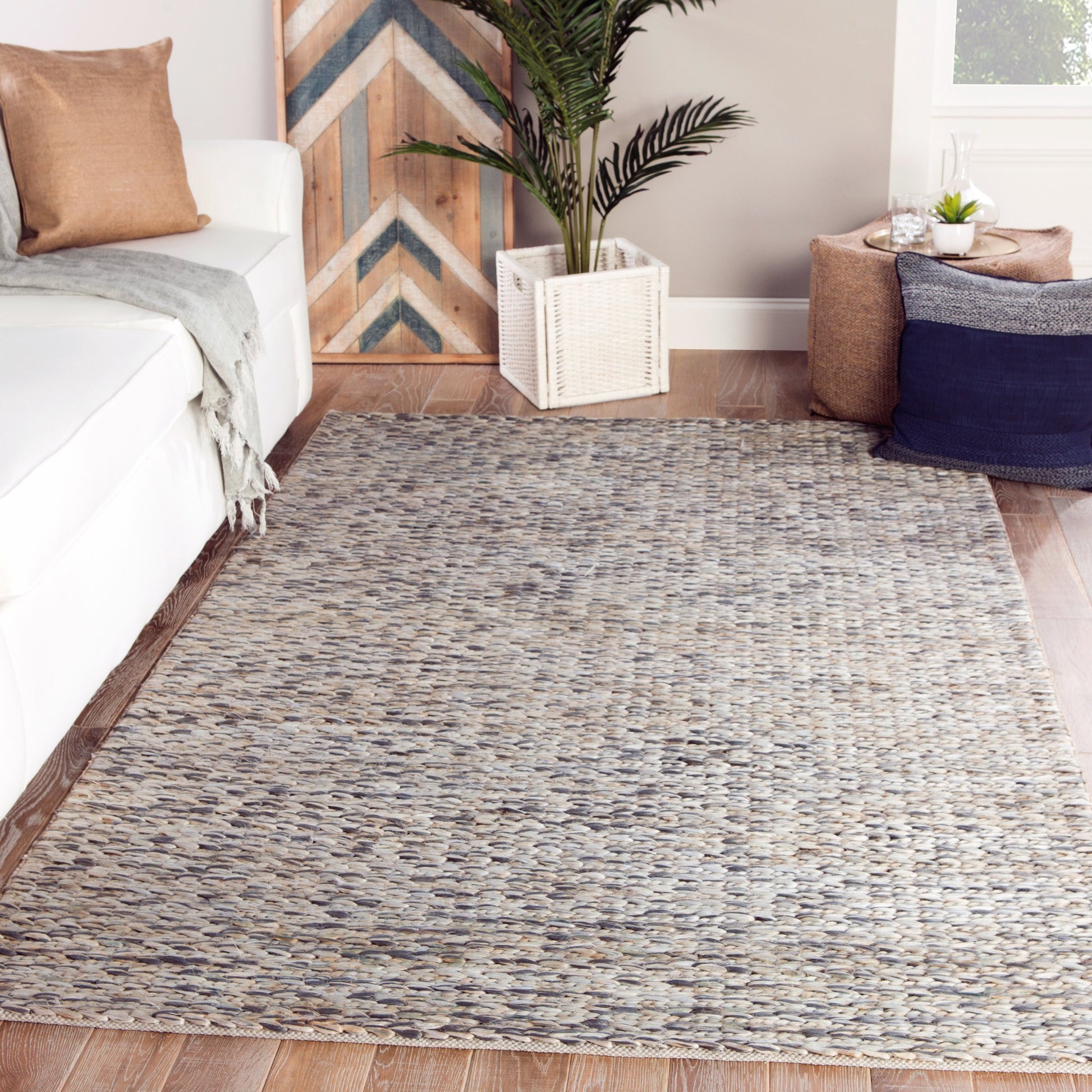 Naturals Monaco NLM05 Rug by Jaipur Living in white. Made from 100% jute in a unique style.