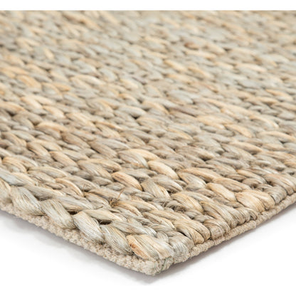 Naturals Monaco NLM05 Rug by Jaipur Living in white. Made from 100% jute in a unique style.