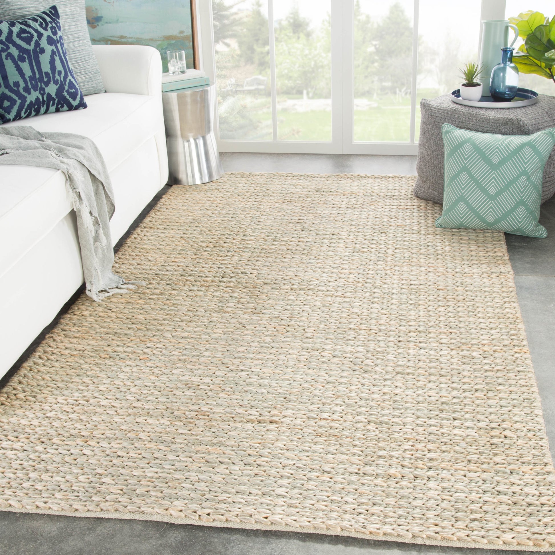 Naturals Monaco NLM05 Rug by Jaipur Living in white. Made from 100% jute in a unique style.