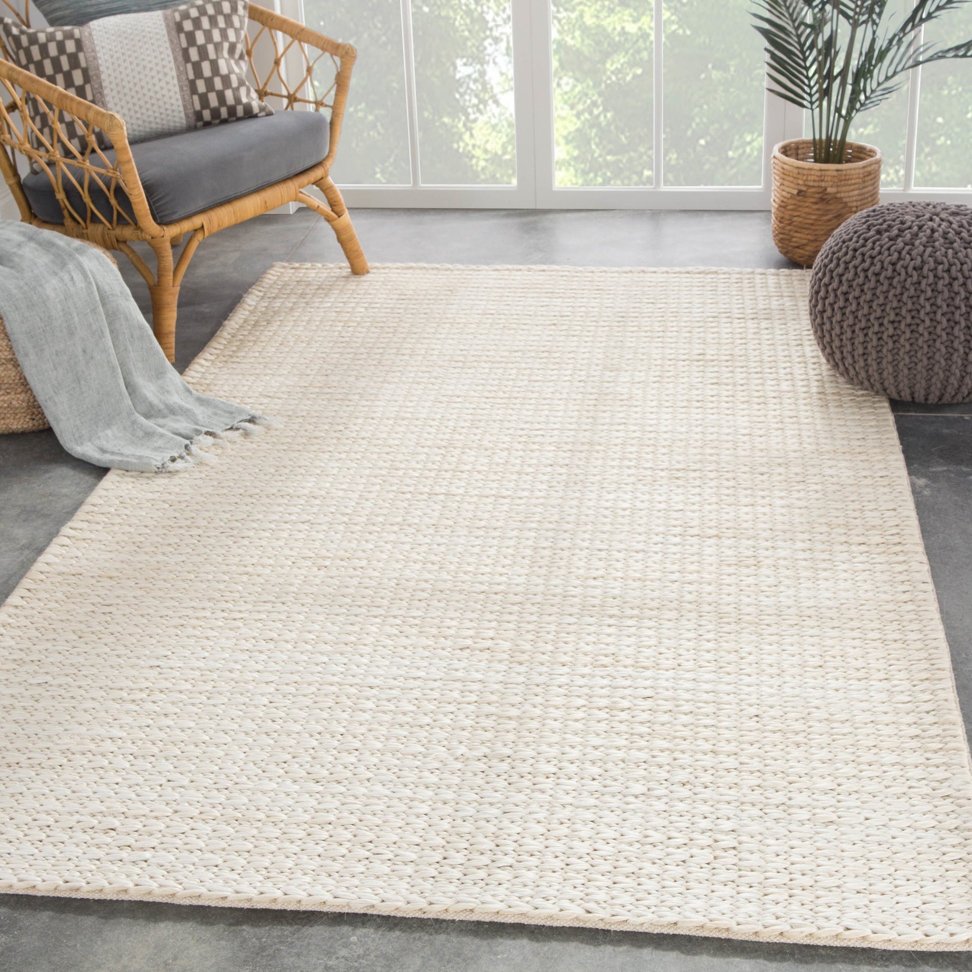 Naturals Monaco NLM05 Rug by Jaipur Living in white. Made from 100% jute in a unique style.