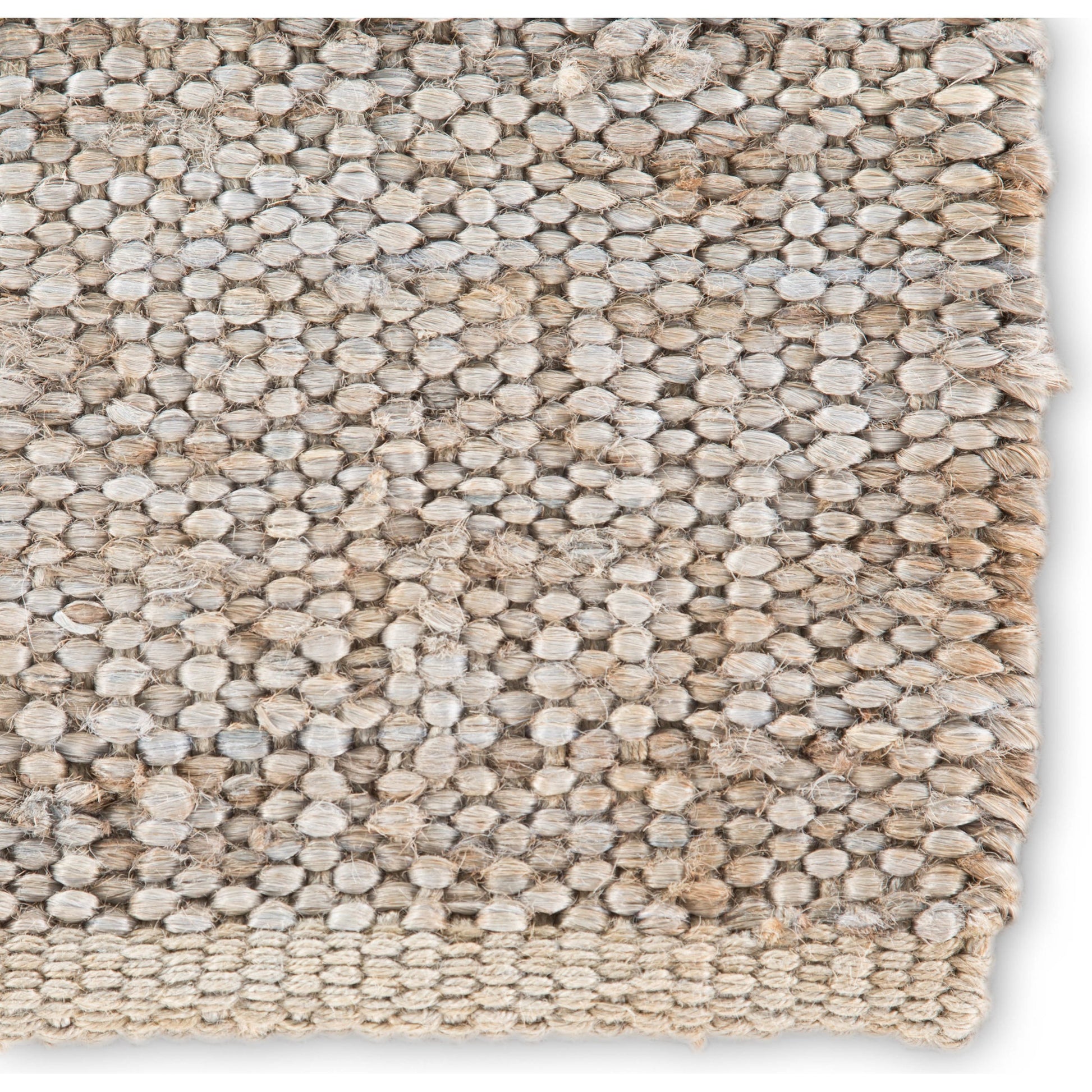 Naturals Monaco NLM08 Rug by Jaipur Living in tan. Made from 100% jute in a unique style.