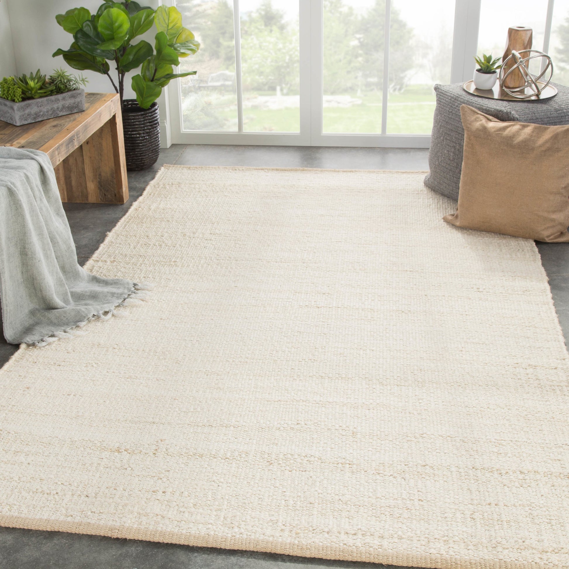 Naturals Monaco NLM08 Rug by Jaipur Living in tan. Made from 100% jute in a unique style.