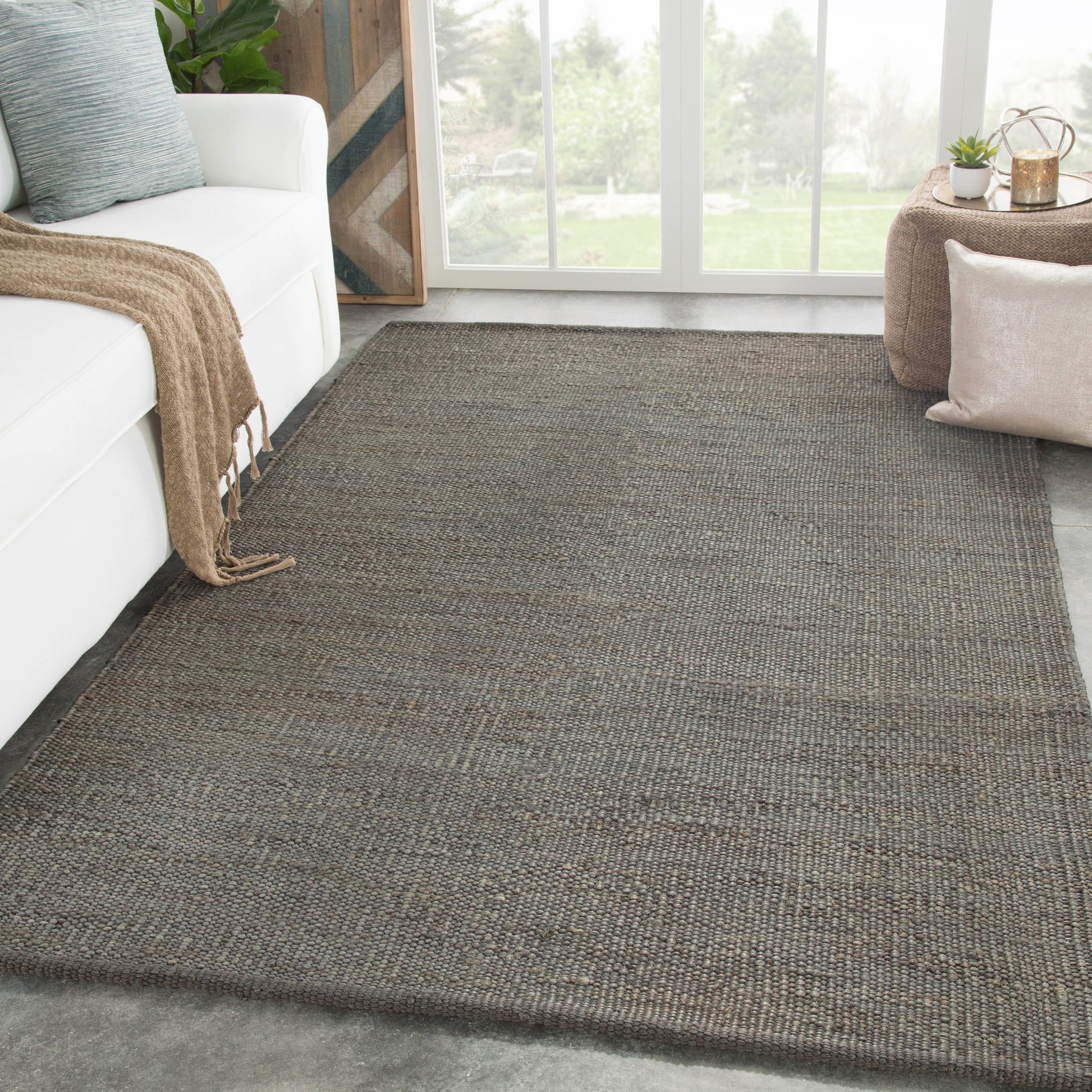 Naturals Monaco NLM08 Rug by Jaipur Living in tan. Made from 100% jute in a unique style.