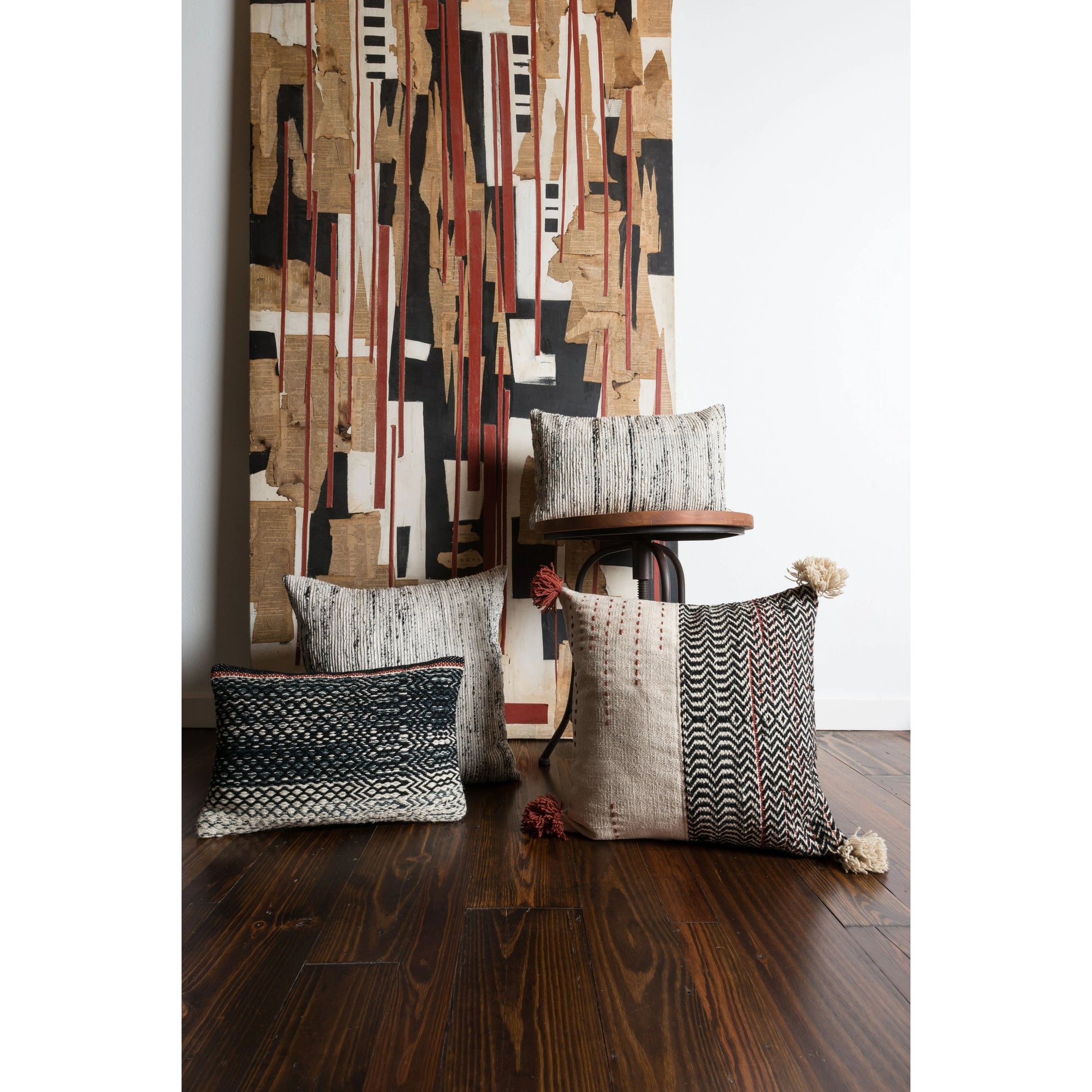 Scratch Pillow by Loloi in black, ivory. Made from 50% wool, 50% cotton in a rustic style.