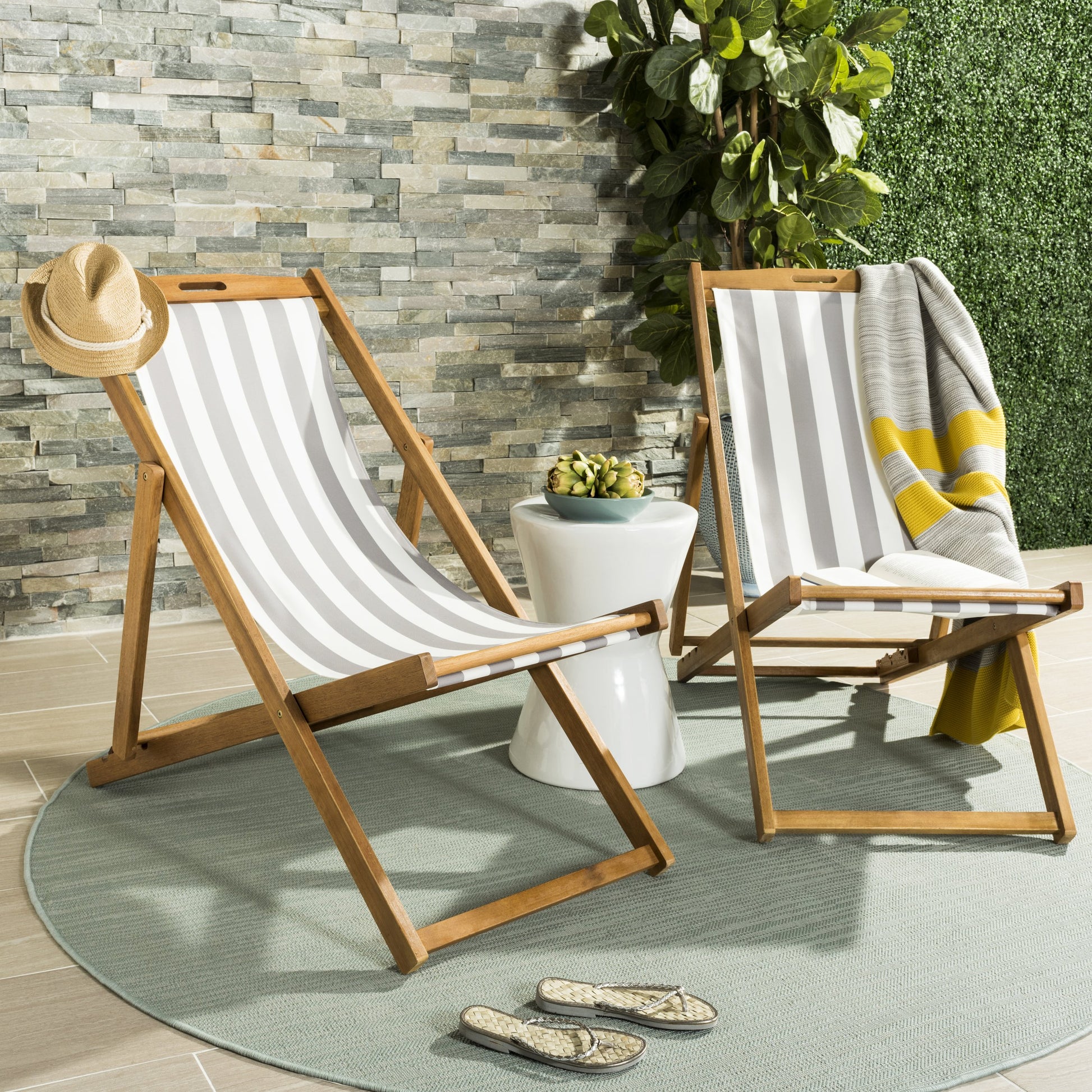 Benton Sling Chair by HedgeApple Essentials. Made from eucalyptus wood, polyester in a coastal style.