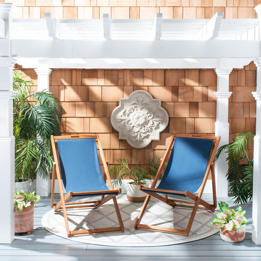 Benton Sling Chair by HedgeApple Essentials. Made from eucalyptus wood, polyester in a coastal style.