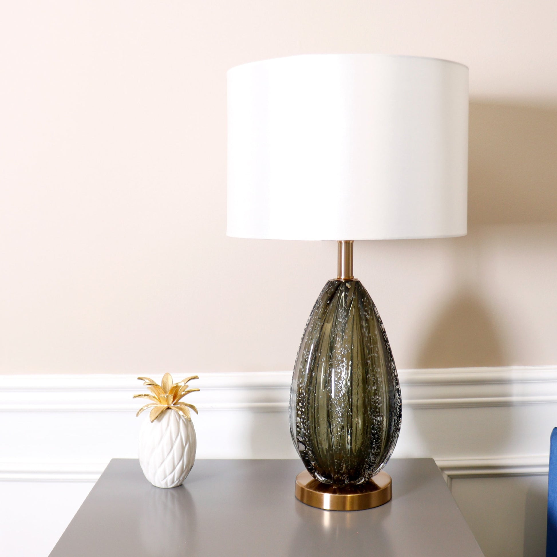 Felicia Table Lamp by Pasargad Home in gold and green. Made from glass, steel in a coastal style.