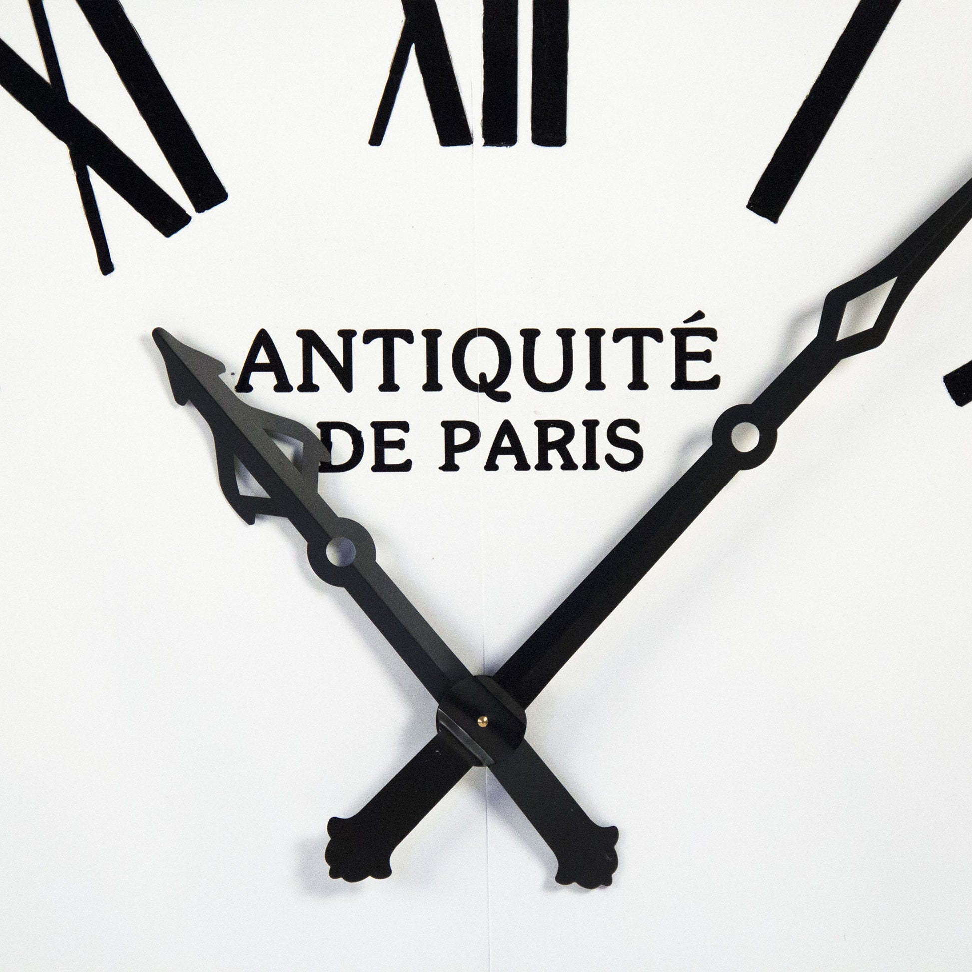 Corvin Wall Clock by Zentique in distressed white with black numbers and iron. Made from iron in a traditional style.