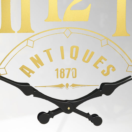 Burnell Wall Clock by Zentique in black, reflectifve glass and iron, mirror. Made from iron, mirror in a traditional style.