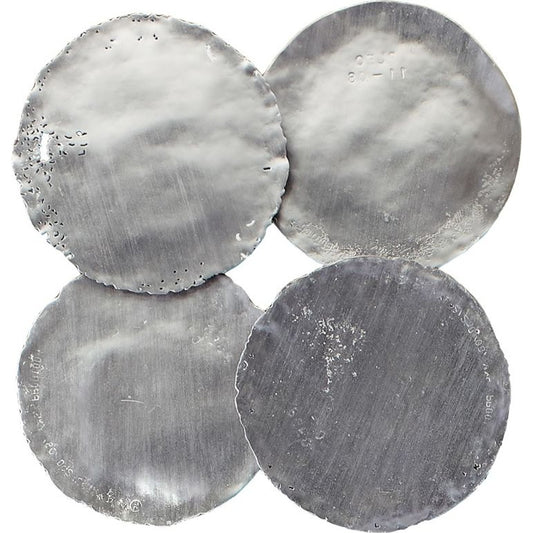 Galvanized Wall Discs by Phillips Collection. Made from resin in a rustic style.