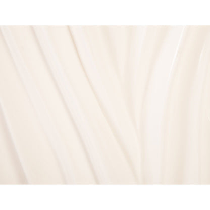 Alon Planter by Phillips Collection. Made from resin in a coastal style.