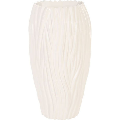 Alon Planter by Phillips Collection. Made from resin in a coastal style.