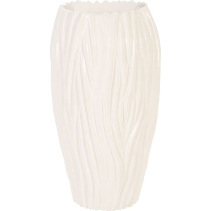 Alon Planter by Phillips Collection. Made from resin in a coastal style.