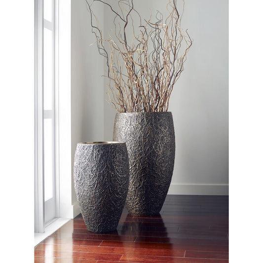 String Theory Planter by Phillips Collection. Made from resin in a eclectic & global style.