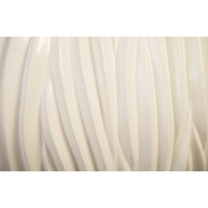 Alon Planter by Phillips Collection. Made from resin in a coastal style.